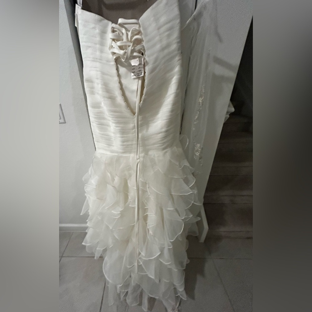 David’s Bridal NEW
Wedding dress -includes everything in picture (veil, crown) - Picture 6 of 15
